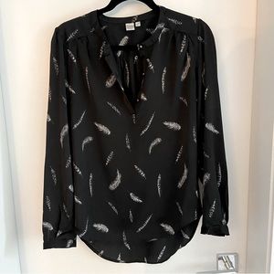 Black, silky blouse with feather pattern. Size medium. TWIK.